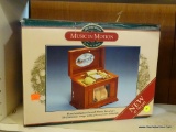 MUSIC IN MOTION MUSIC BOX; HAND CRAFTED REAL WOOD MUSIC BOX THAT PLAYS 15 CHRISTMAS SONGS USING THE