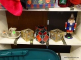 SHELF LOT; NUTCRACKER SOAP DISPENSER, GREEN AND RED STAINED GLASS VOTIVE HOLDERS, PINE CONE THEMED