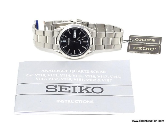 SEIKO SOLAR QUARTZ MEN'S WATCH. NEW OLD STOCK. TAG STILL ATTACHED. INSTRUCTION MANUAL INCLUDED. CAL.