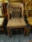 SOLID WOOD CHAIR; THIS CHAIR IS SLIGHTLY BOWED WITH SLATTED BACK RAILS, A SADDLE SEAT, AND 4 BLOCK
