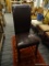 TALL BACK CHAIR; ESPRESSO COLORED LEATHER LOOK CHAIR WITH TALL CUSHIONED BACK AND SEAT. THIS CHAIR