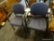 SET OF WHEELED CHAIRS; SET OF 2 BLUE PATTERNED CHAIRS. THESE CHAIRS HAVE A BACK AND SEAT CUSHION,