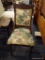 VINTAGE FLAT BACK CHAIR; THE TOP RAIL OF THIS CHAIR HAS CARVED FLORAL DETAILING ON TOP OF AN