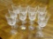 SET OF WHITE WINE GLASSES; THIS SET CONTAINS 10 WHITE WINE GLASSES WITH A DIAMOND DESIGN ON THE BASE