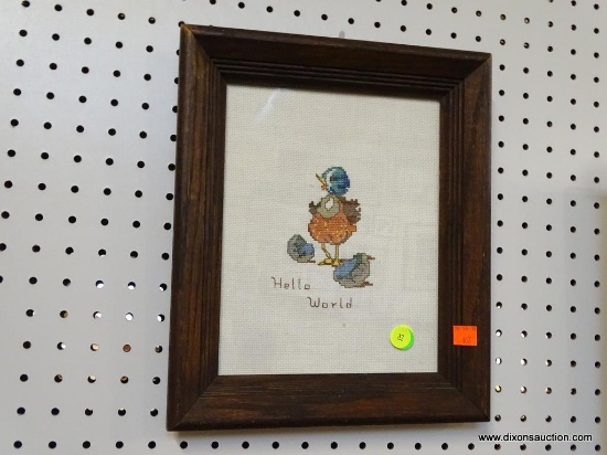 FRAMED NEEDLEPOINT; HANDMADE NEEDLEPOINT OF A NEWLY HATCHED BIRD THAT SAYS "HELLO WORLD" BENEATH IT.