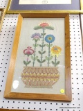FRAMED NEEDLEPOINT; HANDMADE NEEDLEPOINT OF FIVE DIFFERENT TYPES OF FLOWERS IN A PLANTER WITH A
