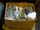 BOX LOT OF OIL LAMPS; THIS BOX CONTAINS THREE GLASS OIL LAMPS, 2 CHIMNEYS, AND A GLASS WHITALL TATUM