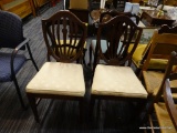 SET OF TWO CHAIRS; SET OF TWO SHIELD BACK DINING CHAIRS. THESE CHAIRS HAVE CREAM COLOR UPHOLSTERED