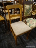 WOODEN SIDE CHAIR; THIS CHAIR HAS SIMPLE BACK WITH A CURVED TOP AND STRAIGHT CENTER RAIL, A LINEN
