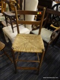 TALL RUSH BOTTOM CHAIR; THIS CHAIR HAS SIMPLE BACK WITH 2 BACK RAILS SUPPORTED BY TWO POSTS WITH