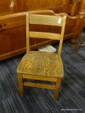 WOODEN CHILD'S CHAIR; THIS IS A SIMPLE WOODEN CHILD'S CHAIR WITH A TWO RAIL BACK, A SADDLE SEAT,