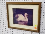 FRAMED SWAN PRINT; THIS PRINT IS OF A SWAN IN THE WATER. IT IS MATTED AND FRAMED IN A WOOD FRAME. IT