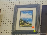FRAMED SEASIDE PRINT; THIS PRINT FEATURES A SEASIDE VIEW WITH TREES AND A BLUE SKY. THIS PRINT IS
