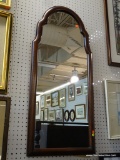 FRAMED MIRROR; COLONY HALL FRAMED MIRROR WITH CURVED CREST. MEASURES 19 IN X 42 IN
