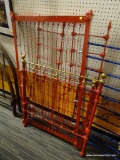 TWIN SIZE BED; BRIGHTLY PAINTED RED AND BRASS TWIN SIZE BED WITH SIDE GUARDS. IS DISASSEMBLED FOR