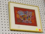FRAMED FABRIC WORK; THIS UNIQUE PIECE USES DIFFERENT COLORS AND LAYERS OF FABRIC TO MAKE THE IMAGE