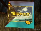 TRIOPOLY BOARD GAME; INAUGURAL EDITION OF THE TRIOPOLY, THE THREE DIMENSIONAL GAME OF BUYING AND