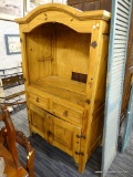 VINTAGE WARDROBE; THIS LARGE WOODEN WARDROBE HAS AN ARCHED TOP ABOVE AN OPEN CENTER AREA (MISSING
