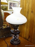 METAL TABLE LAMP; BEAUTIFUL TABLE LAMP THAT LOOKS LIKE AN OLD OIL LAMP. COMES COMPLETE WITH CLEAR