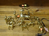 BRASS DEER FIGURINES; THIS LOT CONTAINS 12 SMALL BRASS DEER FIGURINES IN VARIOUS POSITIONS, AND IT