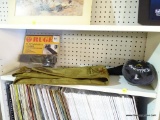 SHELF LOT; INCLUDES A RUGER 10/22 MAGAZINE LOADER (BRAND NEW IN THE PACKAGE!), CLOTH CARRYING BAG,