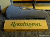 BENELLI GUN CASE; HARD VINYL BENELLI SHOTGUN CARRYING CASE WITH FOAM INTERIOR. RETAIL VALUE $30.