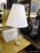 GLASS BASE TABLE LAMP WITH WHITE FAN SHAPED LAMPSHADE AND LOOP FINIAL ON TOP; STANDS ABOUT 21 IN