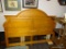 ARCHED TOP PANEL HEADBOARD; IS A KING SIZE. IN GOOD USED CONDITION AND HAS BOLTS FOR RAILS (RAILS