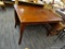 PUB TABLE; SABER LEGGED PUB STYLE TABLE. HAS SOME SCRATCHES TO THE TOP DINING SURFACE BUT IS