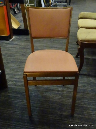FOLDING SIDE CHAIR; VINTAGE FOLDING SIDE CHAIR WITH PINK VINYL SEAT AND BACK. DOES FOLD UP FOR EASY