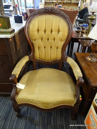 VINTAGE VICTORIAN ARMCHAIR; CARVED WOOD FRAME HAS A FLOWER DESIGN ACROSS THE TOP RAIL, WITH ROUND,