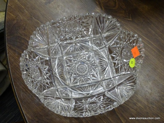 PRESSED GLASS BOWL; PRESSED GLASS PINWHEEL PATTERN PRESSED GLASS CENTER BOWL. MEASURES 10 IN DIA.