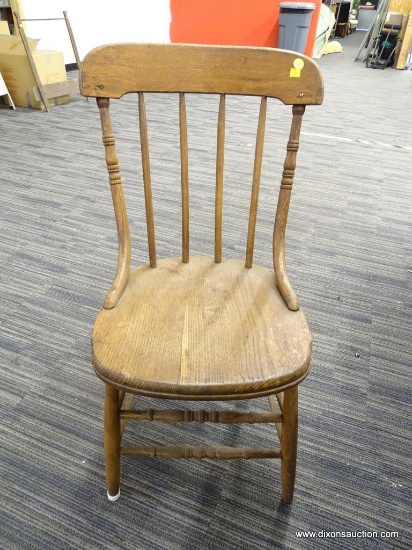SIDE CHAIR; OAK STICK BACK AND PLANK BOTTOM SIDE CHAIR. MEASURES 16 IN X 21 IN X 34 IN
