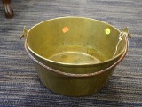 BRASS JAM POT; SOLID BRASS AND METAL HANDLED JAM POT. MEASURES 10 IN X 14 IN