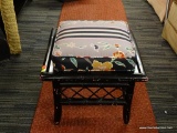 BLACK BAMBOO-LOOK FOOTSTOOL WITH FLORAL PATTERNED TOP; PAINTED BORDER AND BAMBOO DESIGN AROUND SIDES