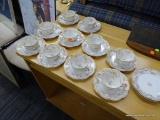 HAVILAND LIMOGES BOUILLON CUP AND SAUCER SETS; TOTAL OF 10 DOUBLE-HANDLED CUPS AND 12 SAUCERS. ALSO