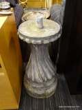 CONCRETE PATIO UMBRELLA STAND/BASE; ROUND TOP WITH SCALLOPED EDGES, TWISTING MIDDLE PORTION AND A