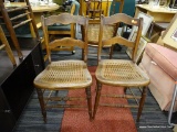 CANE SEAT SIDE CHAIRS; MATCHING PAIR, WALNUT VINTAGE CHAIRS WITH SCALLOPED RAILS ACROSS BACK WITH