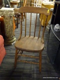 ANTIQUE WOODEN SIDE CHAIR; ROUNDED TOP RAIL WITH STICK BACK AND CURVED PEG-CONSTRUCTED SIDE BRACES,