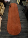 RED OBLONG OVAL BRAIDED RUG; GREAT FOR NARROW SPACES OR HALLWAYS, MEASURES 2FT X 8.2FT.