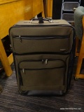 LARGE ROLLING SUITCASE BY DOCKERS; IN OLIVE GREEN/BROWN COLOR. HAS 2 LEATHER HANDLES AS WELL AS A