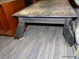 VINTAGE COFFEE TABLE; BLACK WOODEN TABLE WITH GREEN AND TAN MARBLED LAMINATE TOP SURFACE HAS A BIT