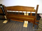 VINTAGE WOODEN SPOOL BED; INCLUDES HEADBOARD AND FOOTBOARD. IS A FULL SIZE. IN VERY GOOD CONDITION.