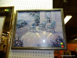 (WALL) FRAMED PORCH PRINT; DEPICTS A SET OF WICKER CHAIRS ON A OPEN BACK PORCH OUTLOOKING INTO THE