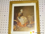 (WALL) FRAMED VINTAGE PRINT; IMAGE OF WOMAN SEATED CUTTING VEGETABLES. IN A WHITE BORDER WITH A GOLD