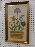 (WALL2) FRAMED EMBROIDERY DECOR; DEPICTS A VASE OF FLOWERS. IN A WOODEN FRAME MEASURES 13 IN X 21 IN