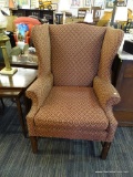 MAROON WINGBACK CHAIR; 1 OF A PAIR OF FLAME STITCHED WINGBACK CHAIRS WITH MAHOGANY LEGS. FABRIC IS