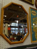 (WALL2) FRAMED MIRROR; OCTAGONAL FRAMED MIRROR IN A WOODEN FRAME. MEASURES 20 IN X 28 IN