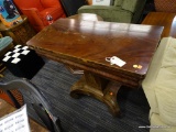 GAME TABLE; MAHOGANY EMPIRE PEDESTAL BASE GAME TABLE. HAS SOME MINOR VENEER ISSUES BUT STILL HAS