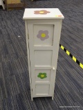 WHITE SINGLE DOOR CABINET; HAS 3 INTERIOR SHELVES AND HAS A FLORAL THEME. GREAT FOR A YOUNG GIRLS